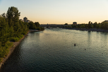 Naklejka premium view of Bow river floing inside Calgary, Alberta, Canada