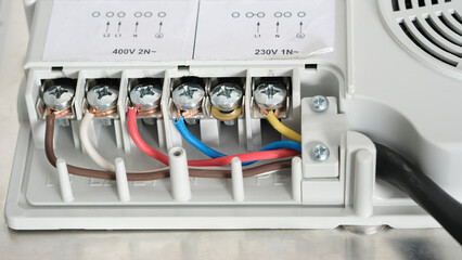 Electrical connection of the induction panel cooker, contacts, electricity. Pofessional wiring and...