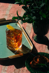 Negroni, an italian IBA cocktail with gin, bitter and vermouth; in luxury elegant home, homemade drink