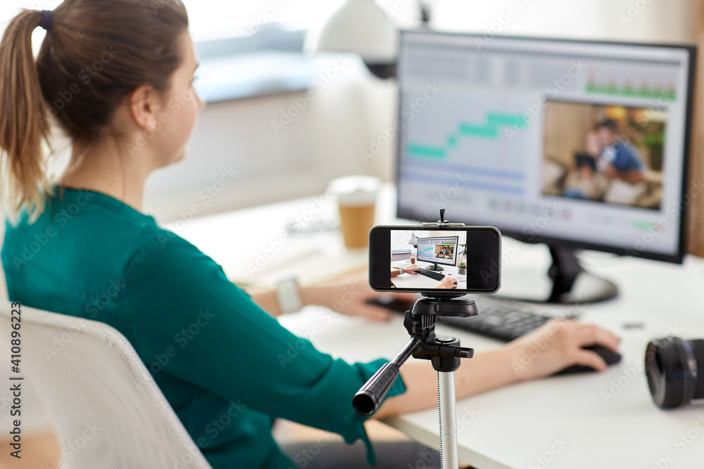 Poster technology, post production and vlog concept - smartphone recording process of woman working in vide