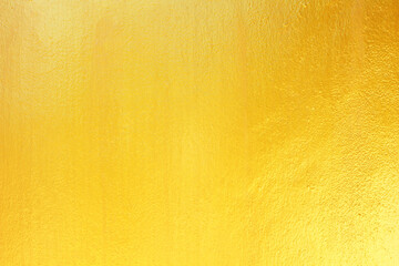 Gold paint on cement wall texture