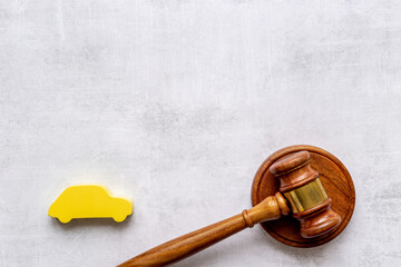 Car and judge hammer - gavel . Insurance law concept