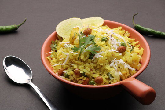 Indian Breakfast aalu Poha Also Know as kande Pohe made up of Beaten Rice or Flattened Rice.