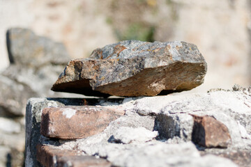 Closeup of a stone with sun rays falling on it