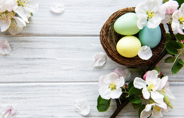 Colorful Easter eggs with spring blossom flowers