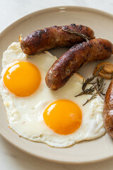 double fried egg with pork sausage
