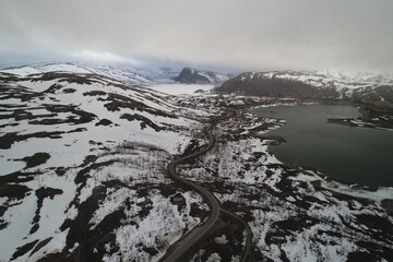 Norway - Norwegian Rural Mountain Landscape, Snowy, long meandering roads.  Aerial View, Drone View