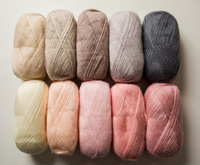The bundles of threads in pastel colors of natural cotton