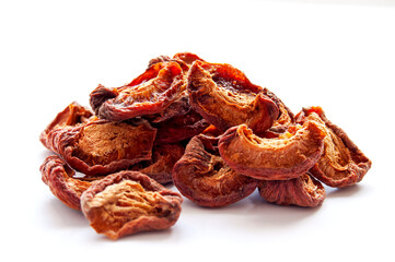 Apricot halves were dried in a fruit dryer, organic product on the white background