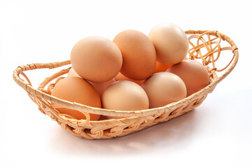 Organic eggs in the basket on the white background