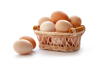 Organic eggs in the basket on the white background