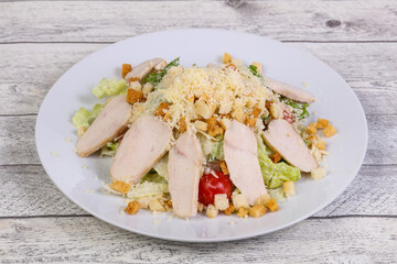 Caesar salad with chicken breast