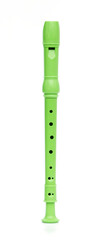 Green block flute isolated on white background © Emre