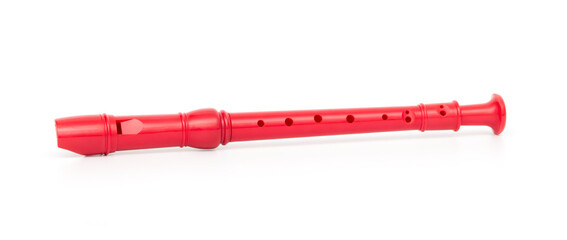 Red block flute isolated on white background © Emre