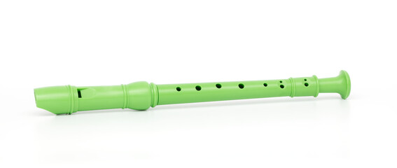 Green block flute isolated on white background © Emre
