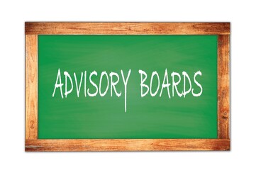 ADVISORY  BOARDS text written on green school board.