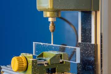 CNC  milling machine processes glass