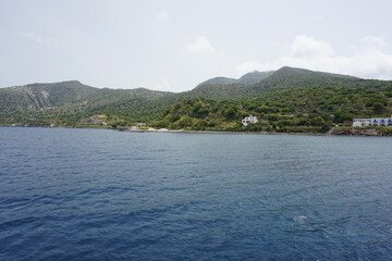 Fototapeta na wymiar the view from the ferry close to the port of Mandraki, Nisyros Island, Greece, May