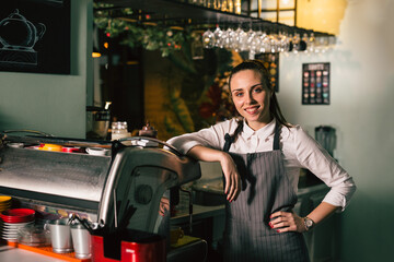 Fototapeta na wymiar happy waitress posing in cafeteria