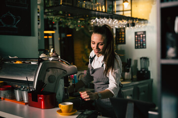 waitress preparing coffee in cafeteria