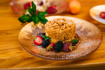 dessert with berries on a decorated table