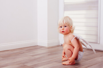 the toddler makes a show on Valentine's day at home