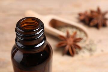 Bottle of anise essential oil, closeup. Space for text