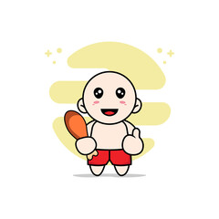 Obraz premium Cute kids character holding a chicken meat.