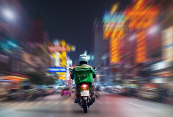 Food delivery drivers are driving to deliver products to customers who order online. Impact of epidemics