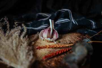 Garlic on a rustic chopping board