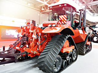 Replaceable continuous track drive for harvester