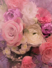 Flower vertical background 
behind the misted glass with pink roses and carnation, purple tulips,
white eustoma and chrysanthemums
