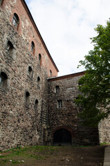 Fototapeta premium The walls of medieval Vyborg castle with Olav tower in Leningrad region Russia