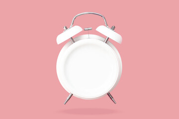 Top view Creative layout of bell Alarm clock with blank plate hovering over pink pastel background. minimal idea business Concept of intermittent fasting, lunchtime, diet and weight loss. copy space 