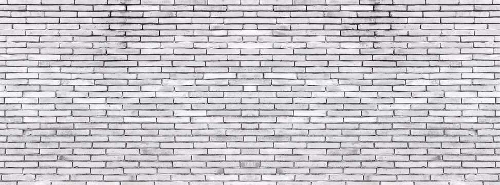Old vintage retro style grey bricks wall for brick background and texture.