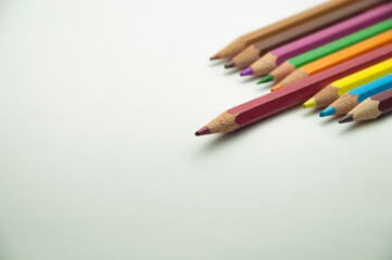 colored pencils on a white background. education concept. illustration of training.