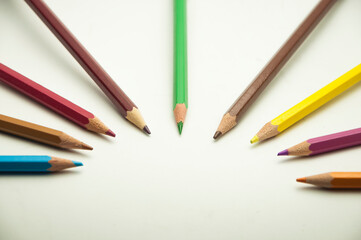 colored pencils on a white background. education concept. illustration of training.