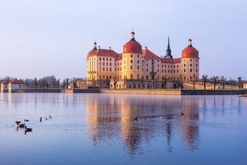 Moritzburg castle after sunrise at winter time, Germany