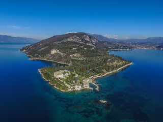 Fototapeta premium Baia delle Sirene, Punta San Vigilio - Garda Lake, Italy. Beautiful view on lake, italian summer view aerial by Drone