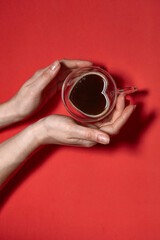 Valentines day hearts background. Woman Holding Hot Cup Of Coffee, With Heart Shape Stock Photo....