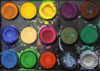 close up of colorful watercolor paints