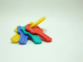 Set of toy keys. Colored plastic keys. Baby rattle. Toy for babies and toddlers.