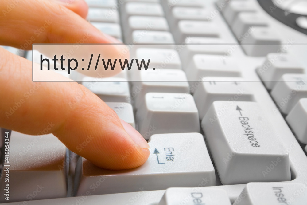 Poster finger presses the computer key enter with search bar