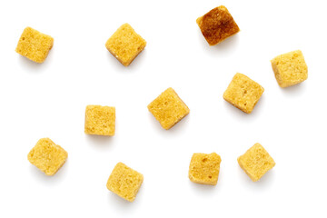 Cluster crispy croutons. Cubes of bread toasted and fried in oil. Isolated white background