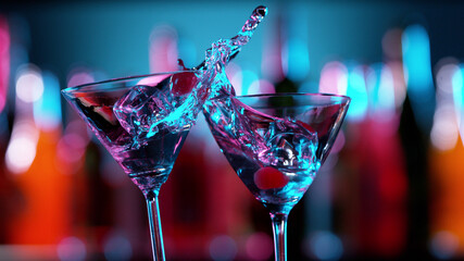 Closeup of splashing martini cocktails