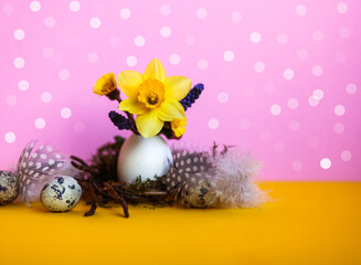 easter background with rabbit,eggs,daffodils 