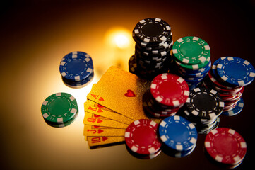 Poker. Game pieces are on the table. Game chips for betting in gambling. Poker chips. Playing cards. 