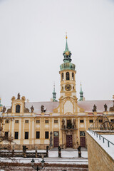 Baroque pilgrim place Loreto Monastery, facade of Prazska Loreta Church of  Nativity of Our Lord,...