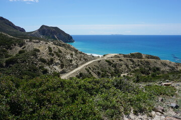 the view of the Kavo Paradiso Beach from the hiking trail, Vigles Agrielia Thymianos Richtis...