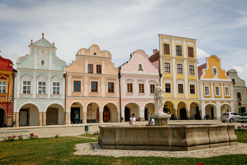 Main town square Zachariase z Hradce with renaissance and baroque colorful historical buildings and fountain, Romantic houses with arches on sunny day, Telc, Czech Republic